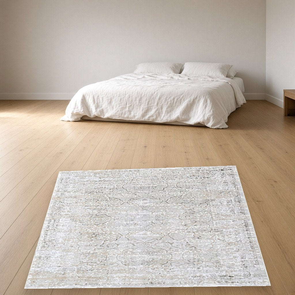 Almond Distressed Medallion Modern Area Rug in a bedroom