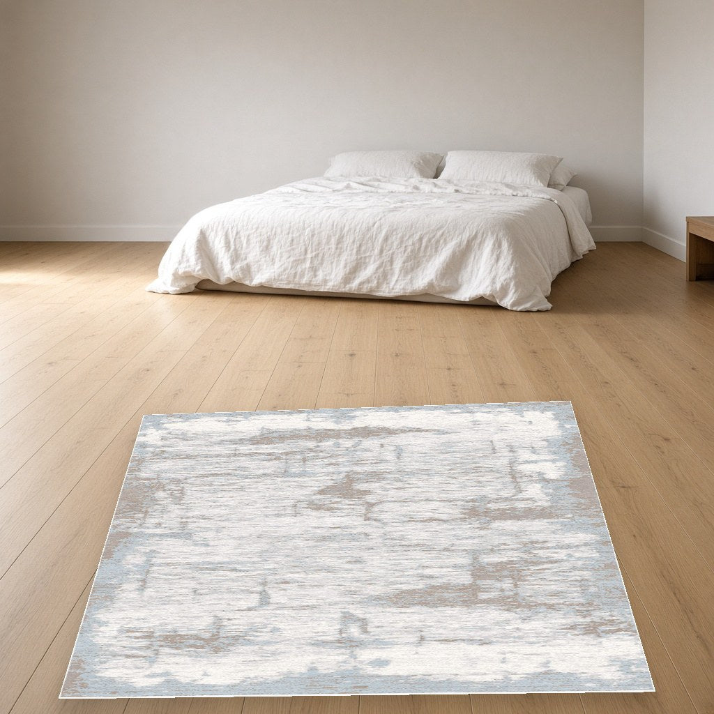 Iron Faded Abstract Modern Area Rug in a bedroom