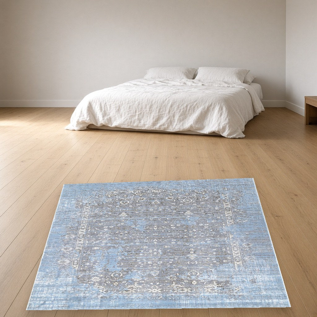 Iron Faded Medallion Modern Area Rug in a bedroom