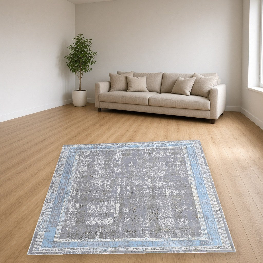 Iron Greek Key Modern Area Rug in a living room