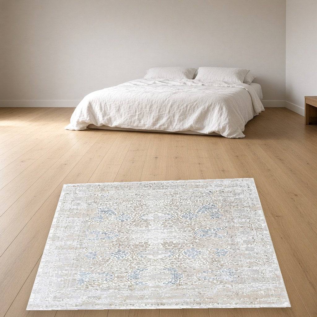 Pearl Distressed Medallion Modern Area Rug in a bedroom
