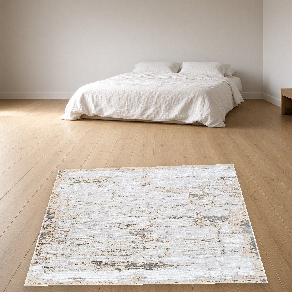 Pearl Faded Abstract Modern Area Rug in a bedroom