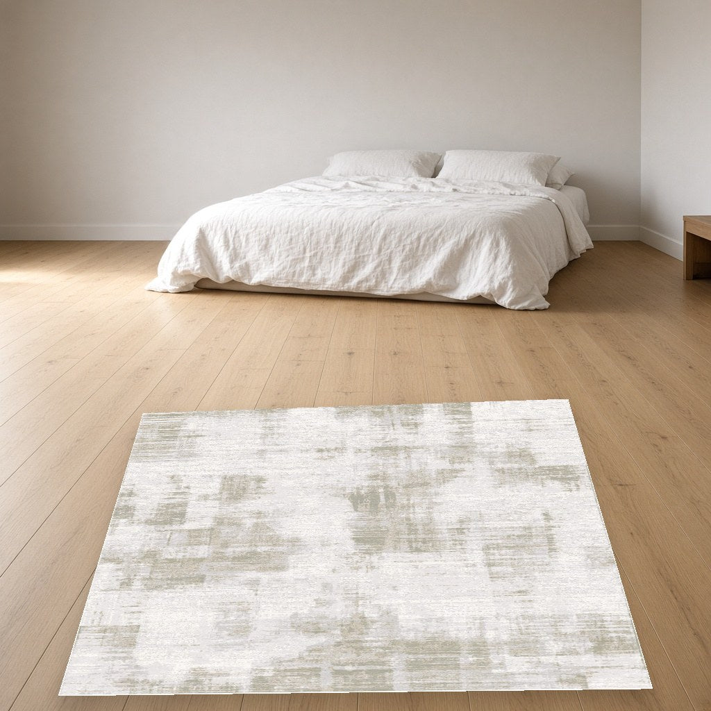 Pista Mottled Abstract Modern Area Rug in a bedroom