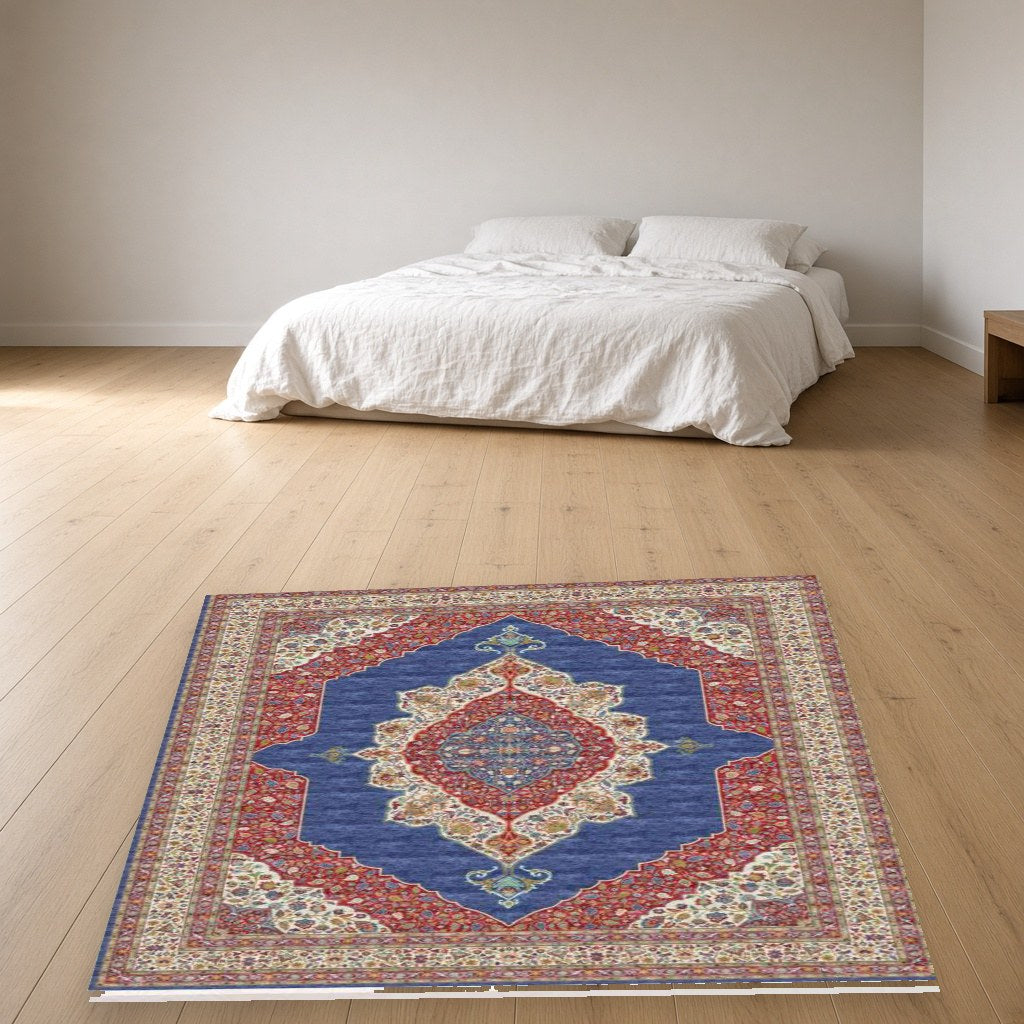 Navy Pointed Medallion Heritage Rug in a bedroom