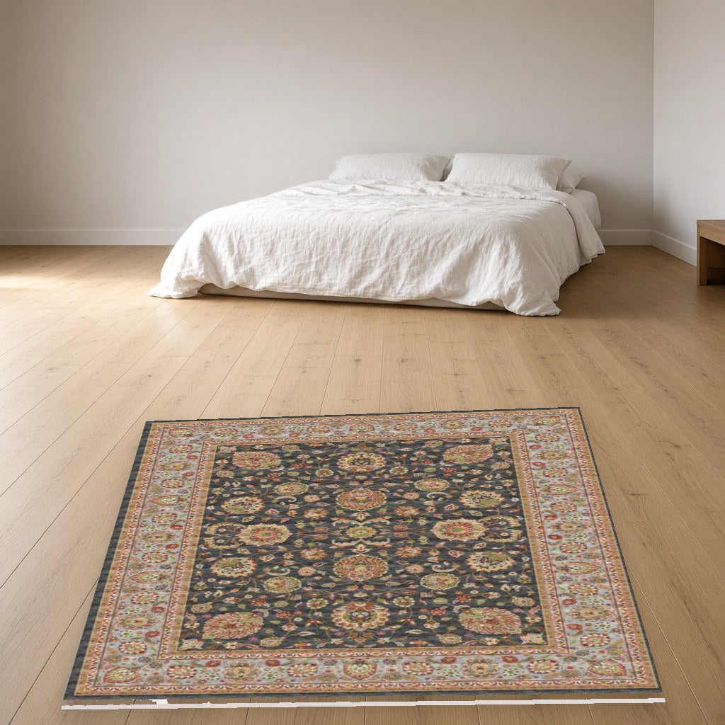 Navy Vine Medallion Heritage Rug in a bedroom