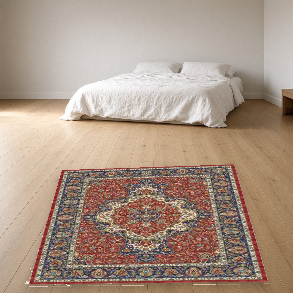 Navy and Red Medallion Heritage Rug in a bedroom