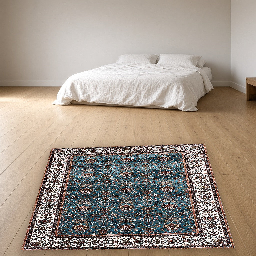Aqua Beige Garden Border Floral Mogul Area Rug in a bedroom