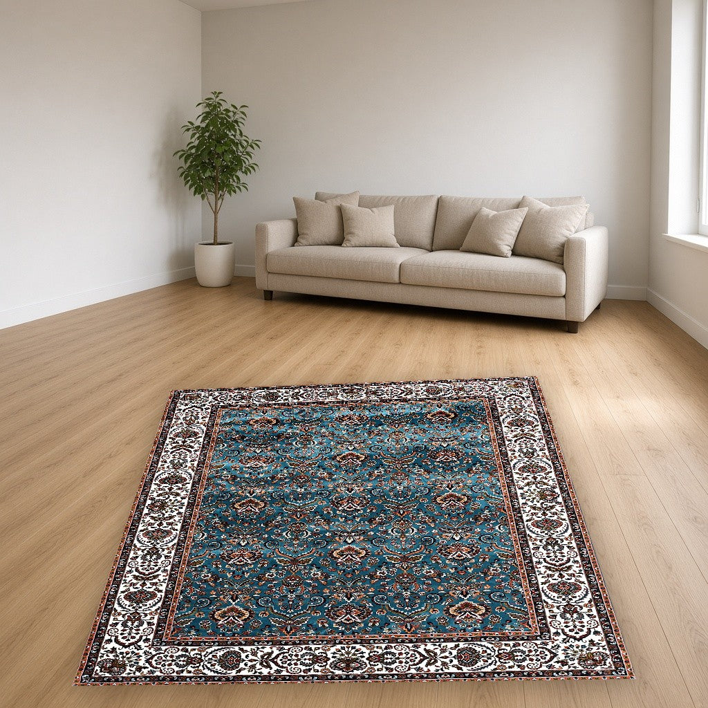 Aqua Beige Garden Border Floral Mogul Area Rug in a living room
