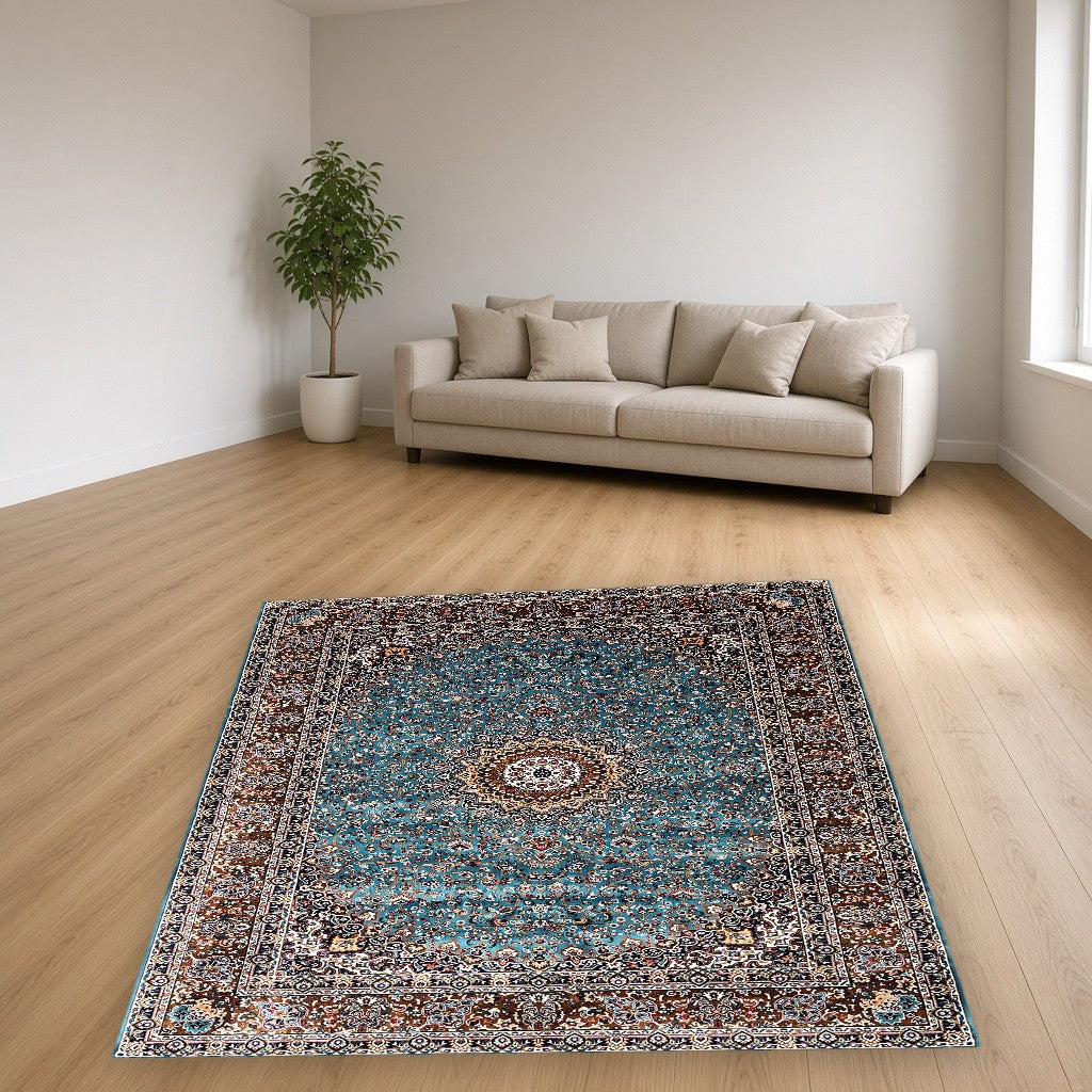 Aqua Brown Royal Centerpiece Mogul Area Rug in a living room