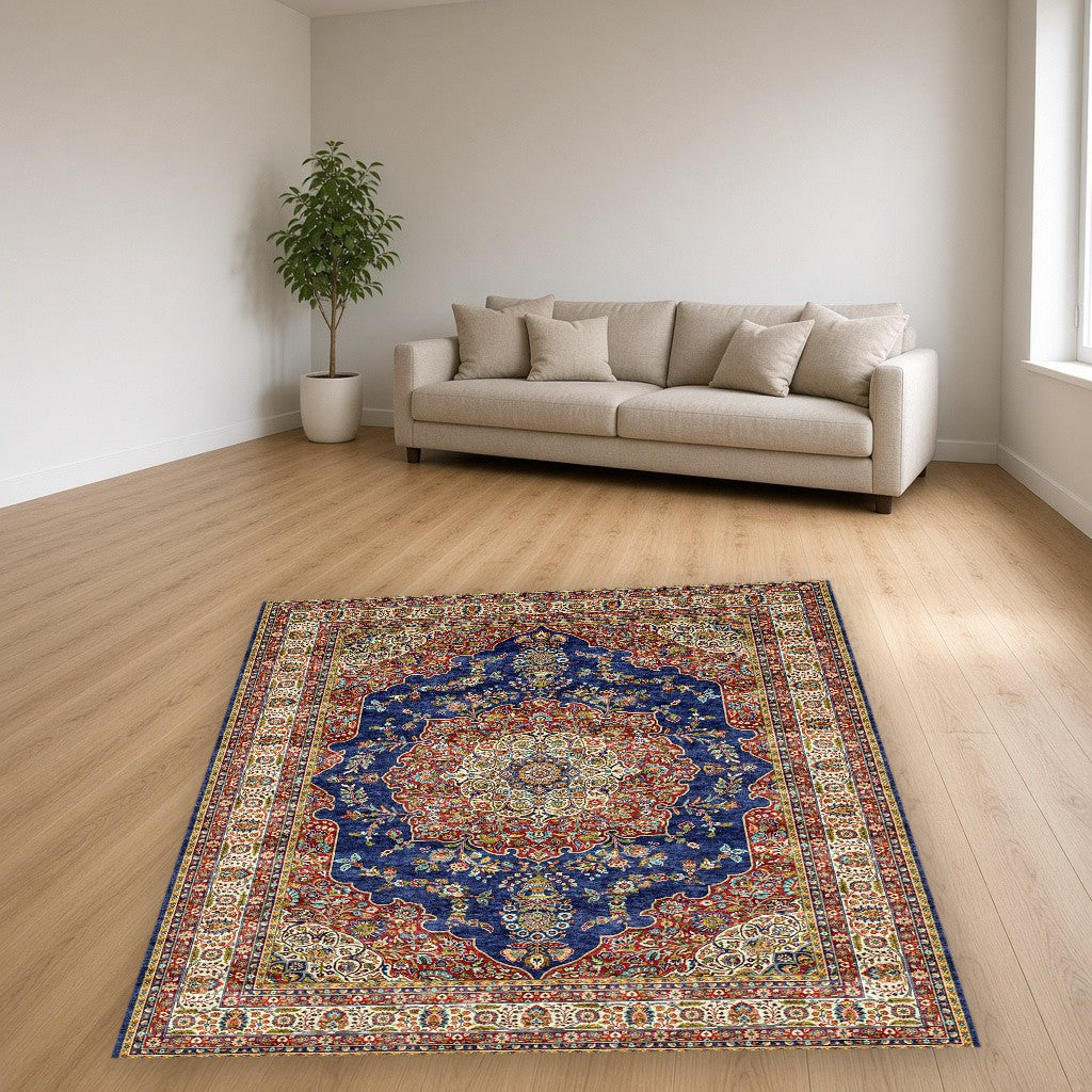 Navy White Grand Medallion Mogul Area Rug in a living room