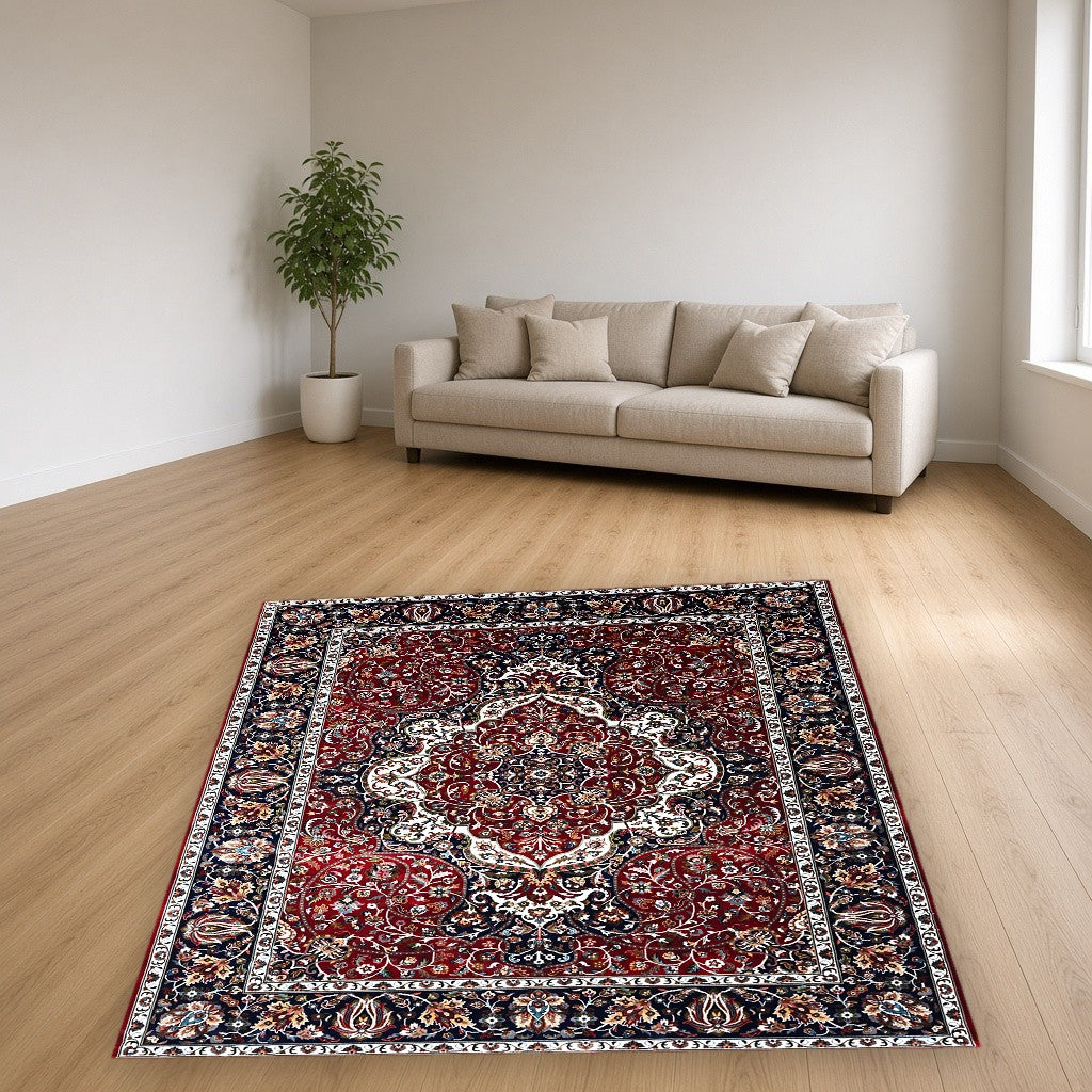 Red Navy Jewel Tone Floral Mogul Area Rug in a living room