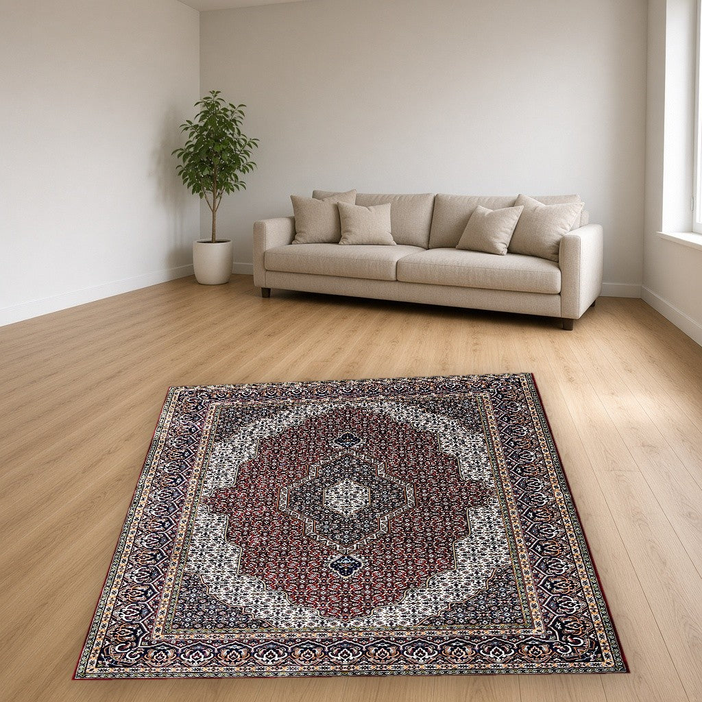 Red Ornate Floral Lattice Mogul Area Rug in a living room