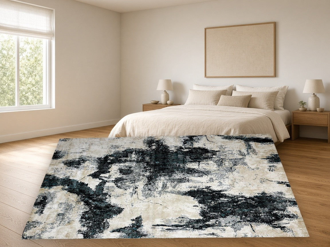Charcoal Splash New York Area Rug in a bedroom