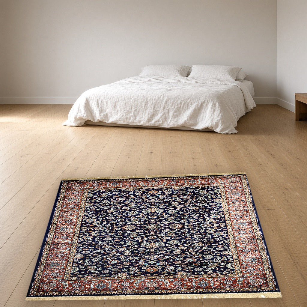 Navy Rust Court Floral Royal Area Rug in a bedroom