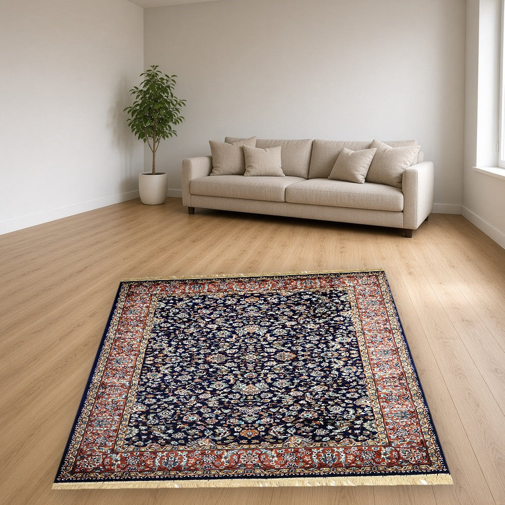 Navy Rust Court Floral Royal Area Rug in a living room