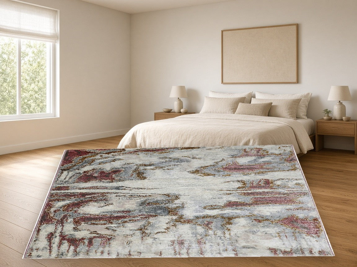 Burgundy Patina Abstract Area Rug in a bedroom