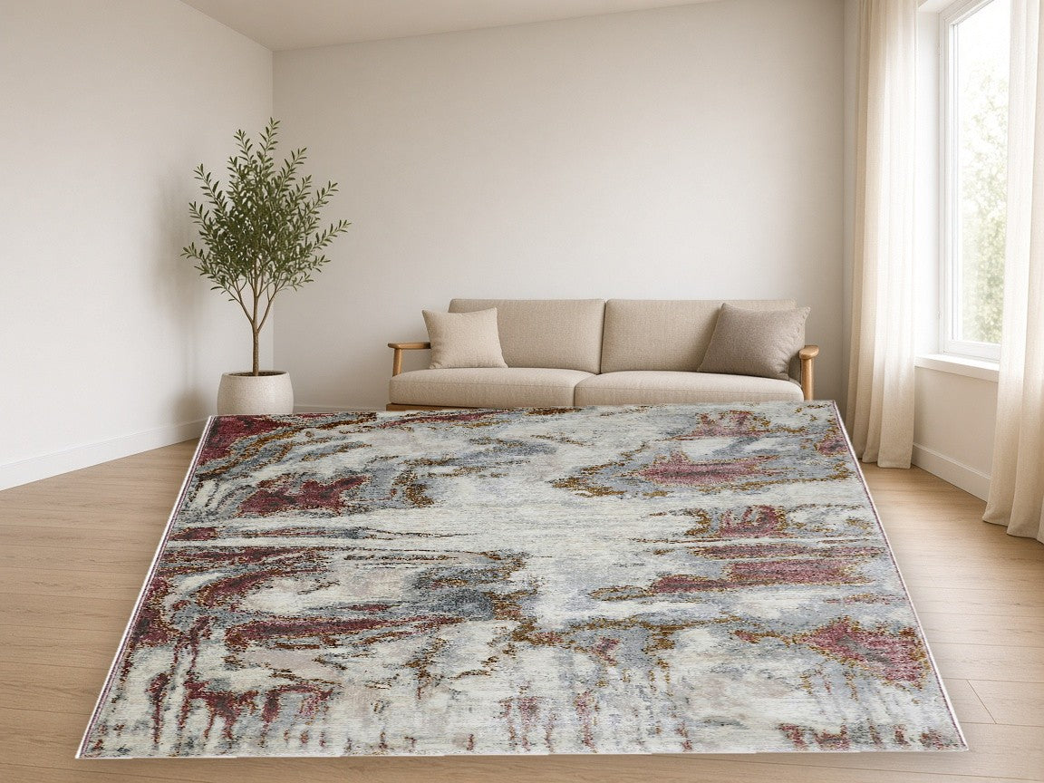 Burgundy Patina Abstract Area Rug in a living room