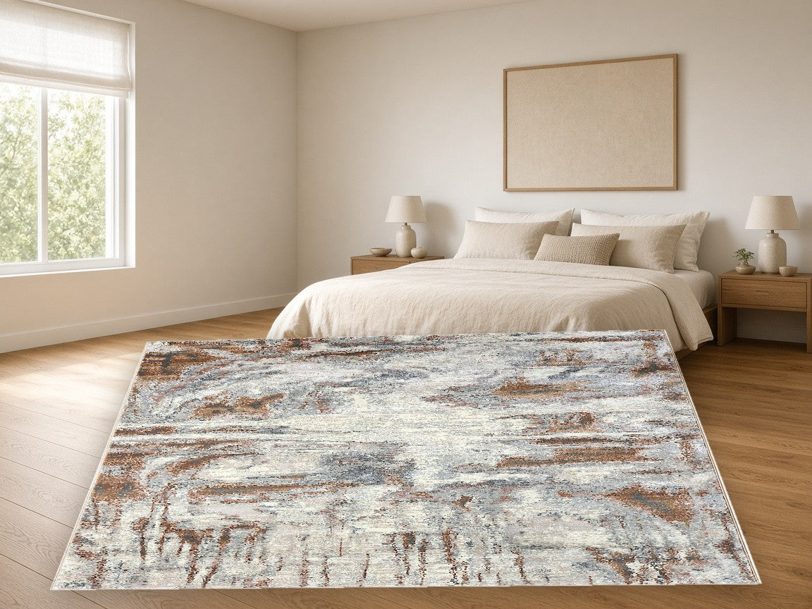 Copper Drift Abstract Area Rug in a bedroom