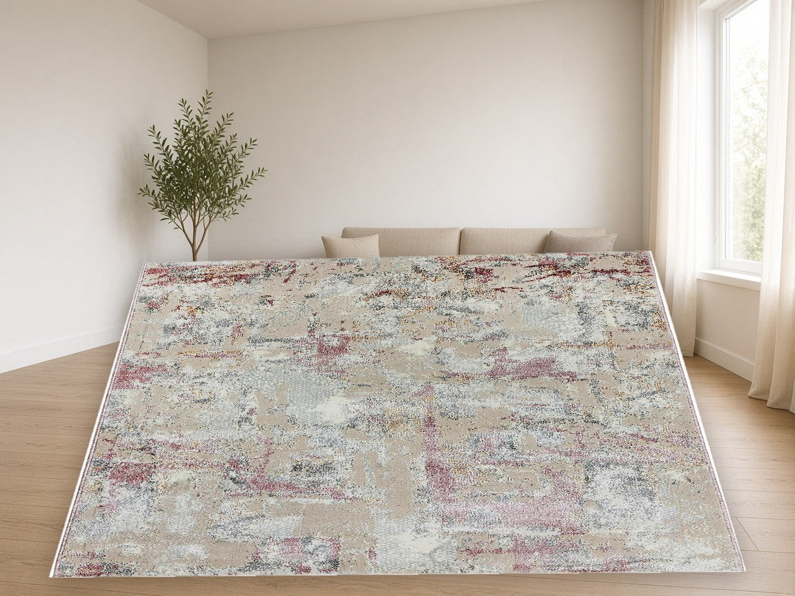 Dusty Rose Wash Abstract Area Rug in a living room