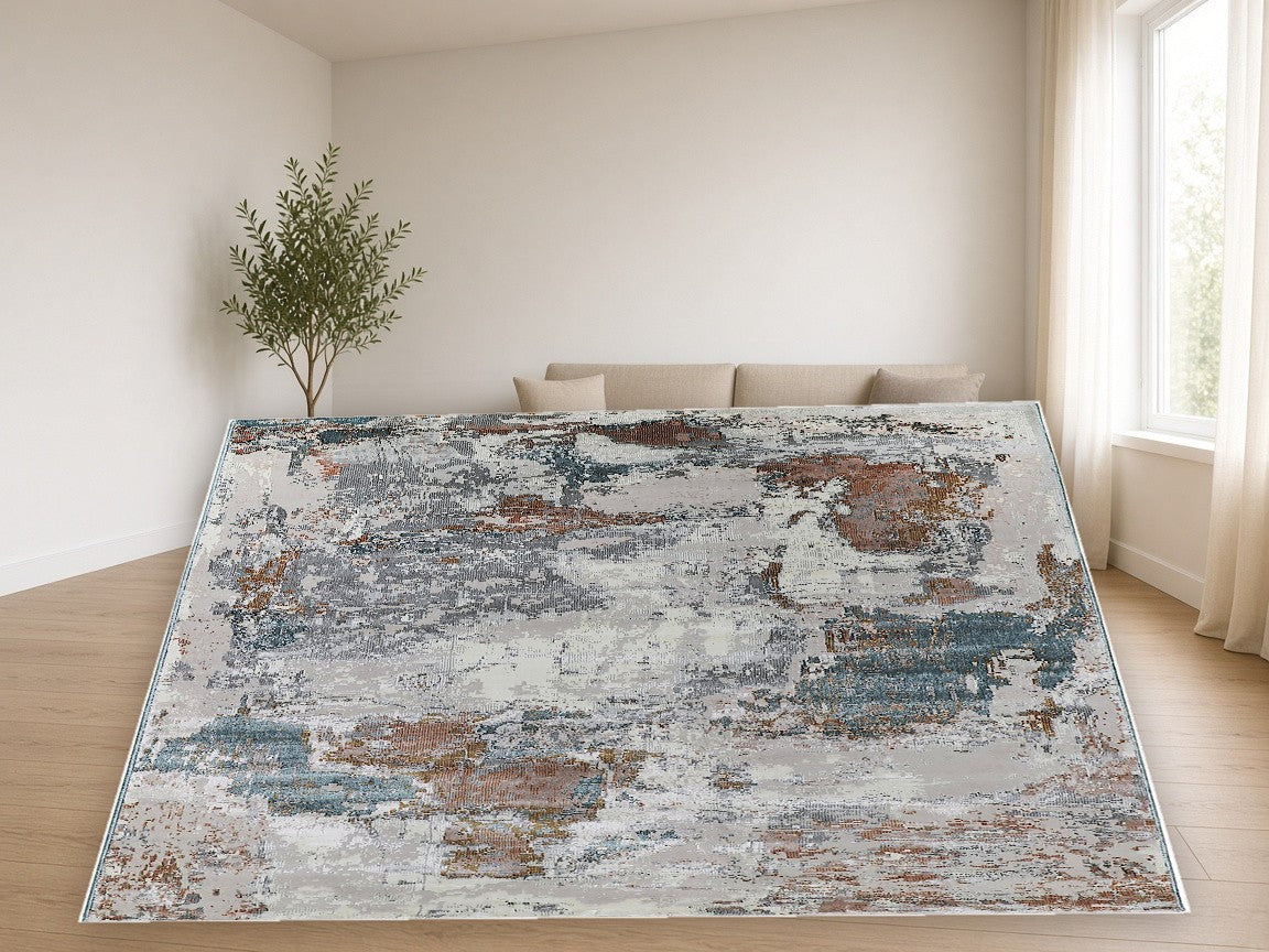 Indigo Patch Abstract Area Rug in a living room