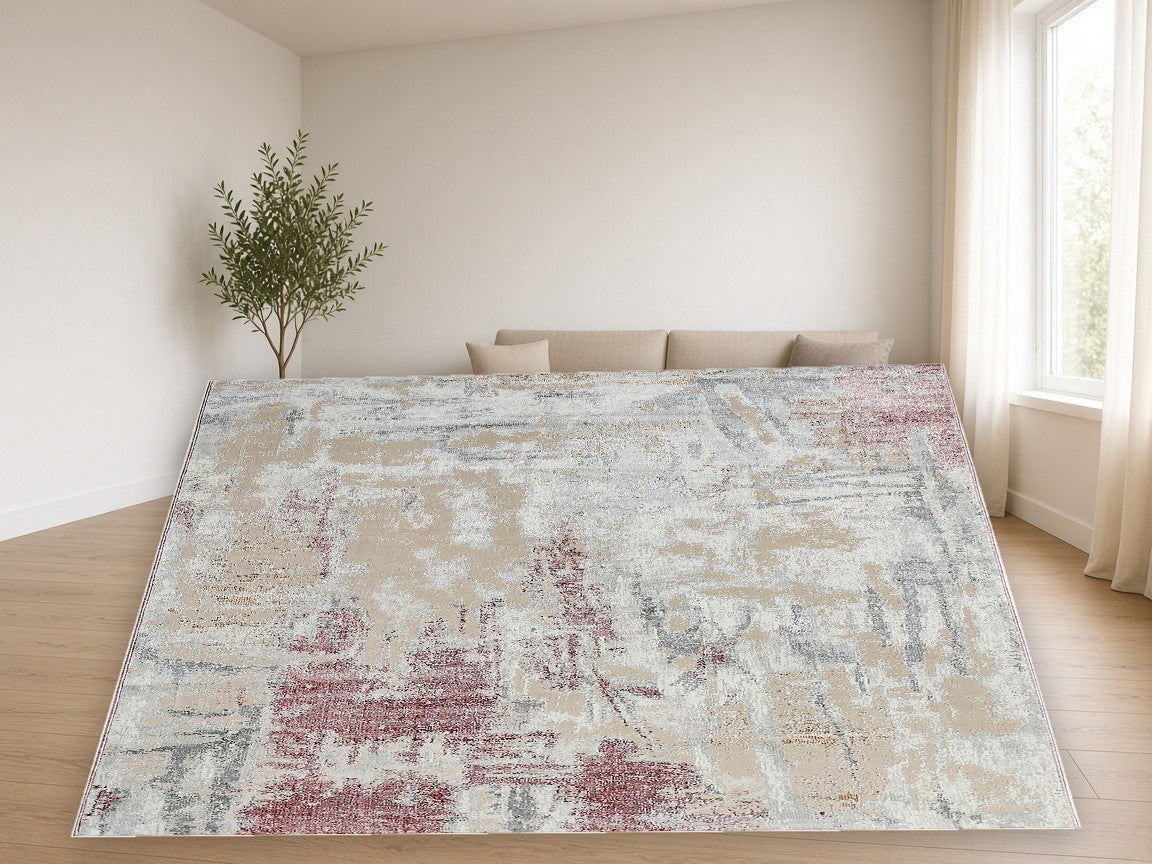 Magenta Streak Abstract Area Rug in a living room