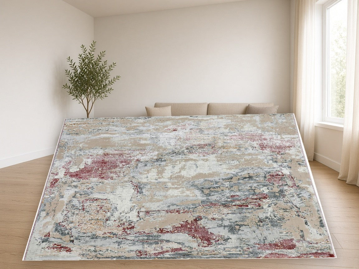 Rose Charcoal Splash Abstract Area Rug in a living room