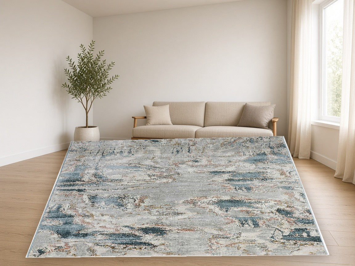 Slate Blue Cloud Abstract Area Rug in a living room