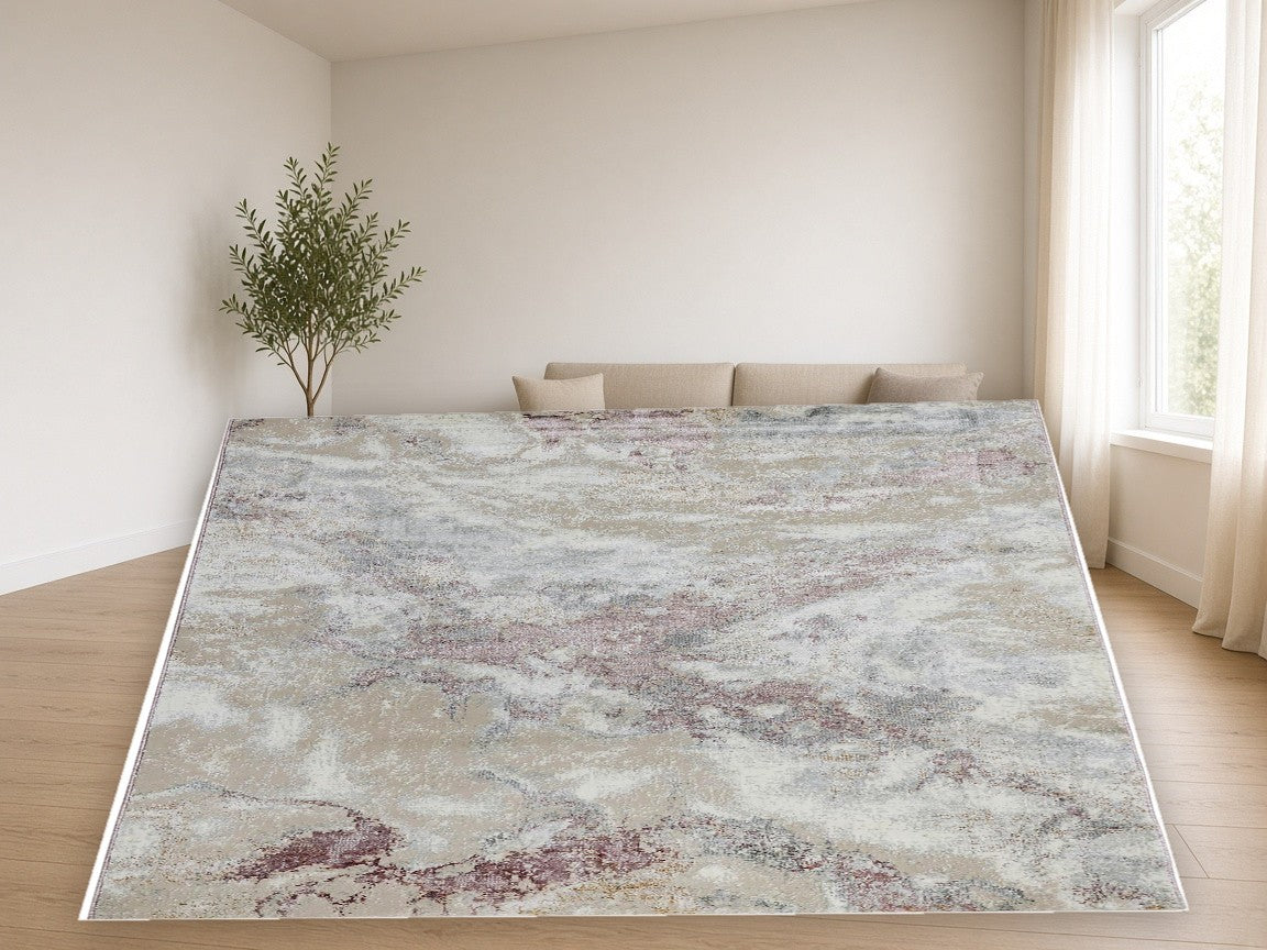 Soft Mist Abstract Area Rug in a living room