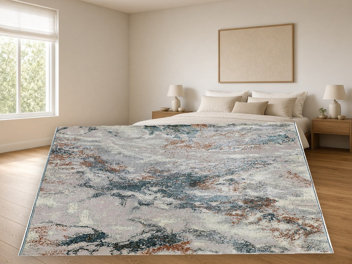 Teal Rust Marble Abstract Area Rug in a bedroom