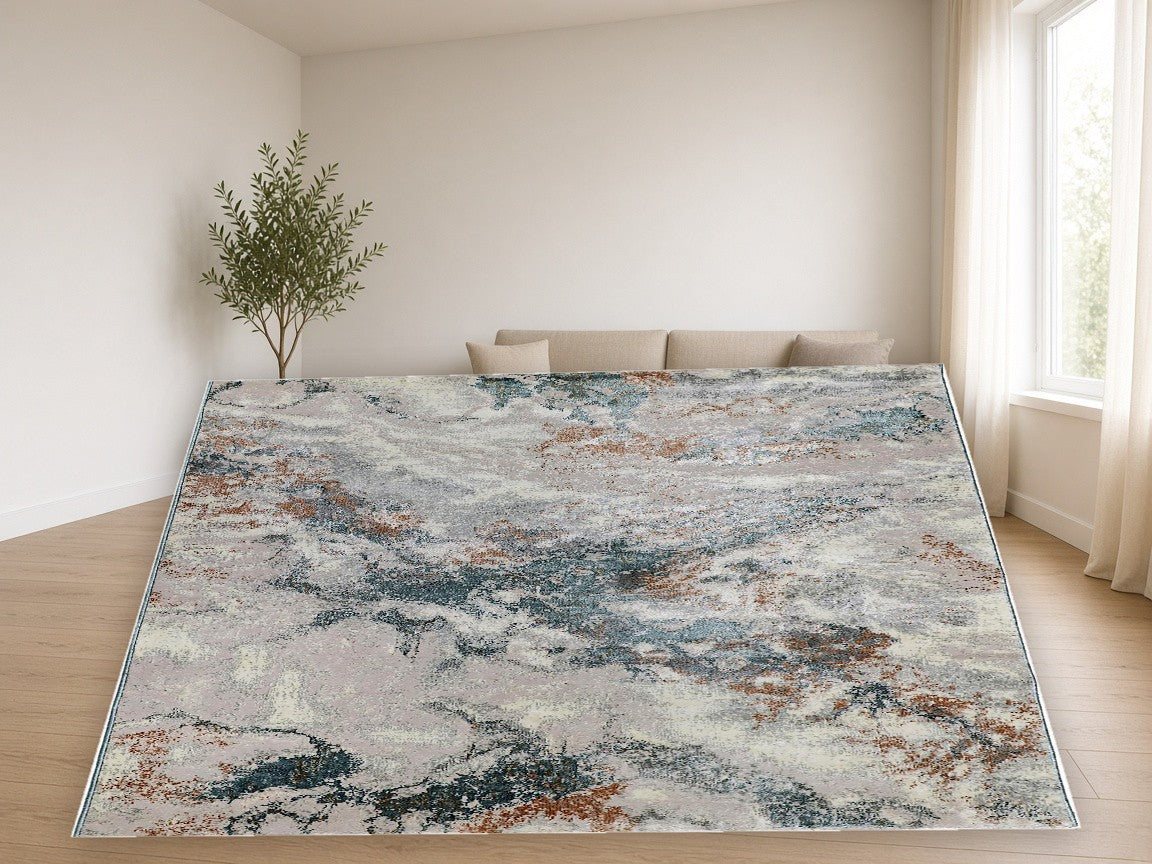 Teal Rust Marble Abstract Area Rug in a living room