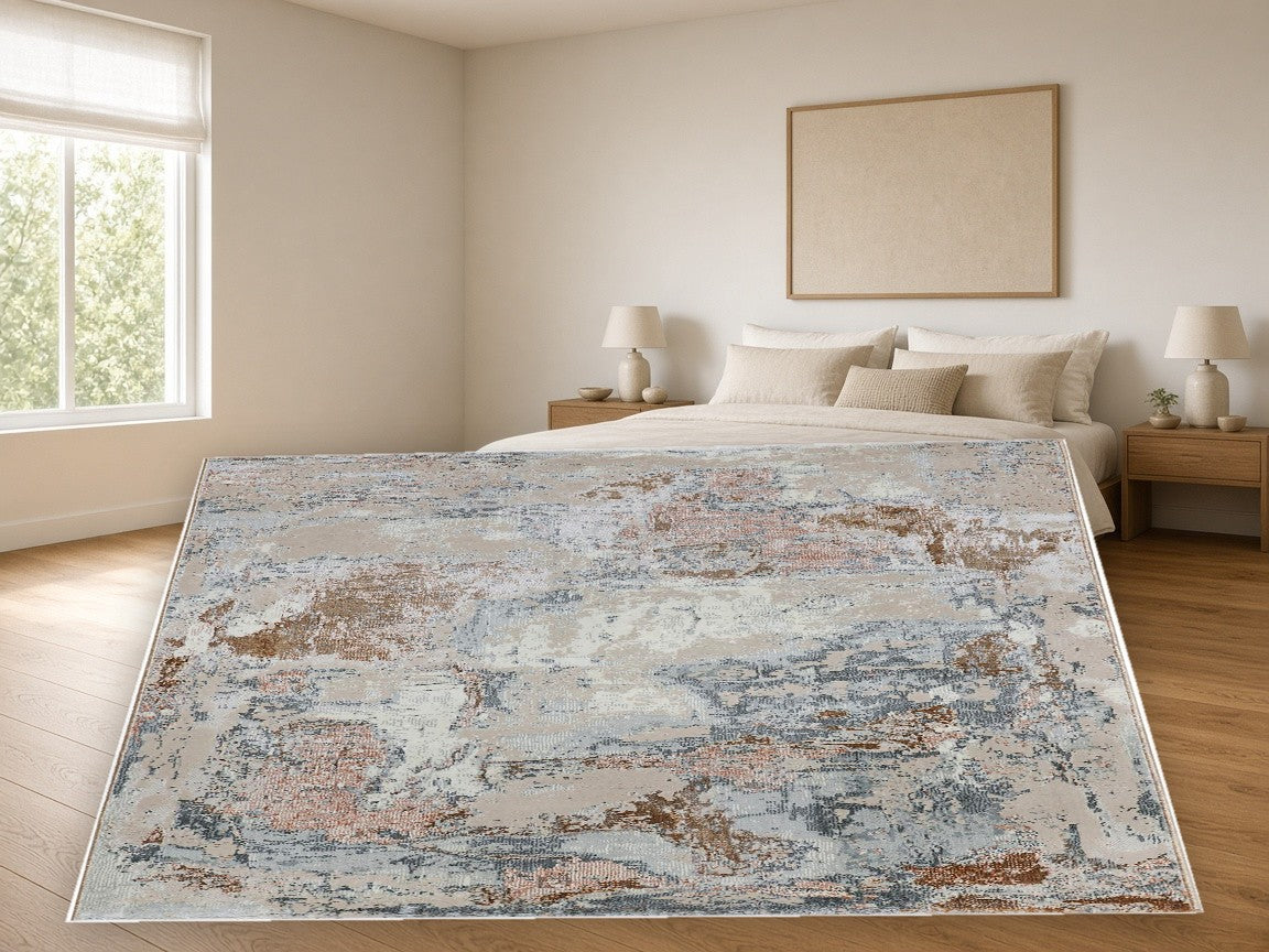 Terracotta Mix Abstract Area Rug in a bedroom