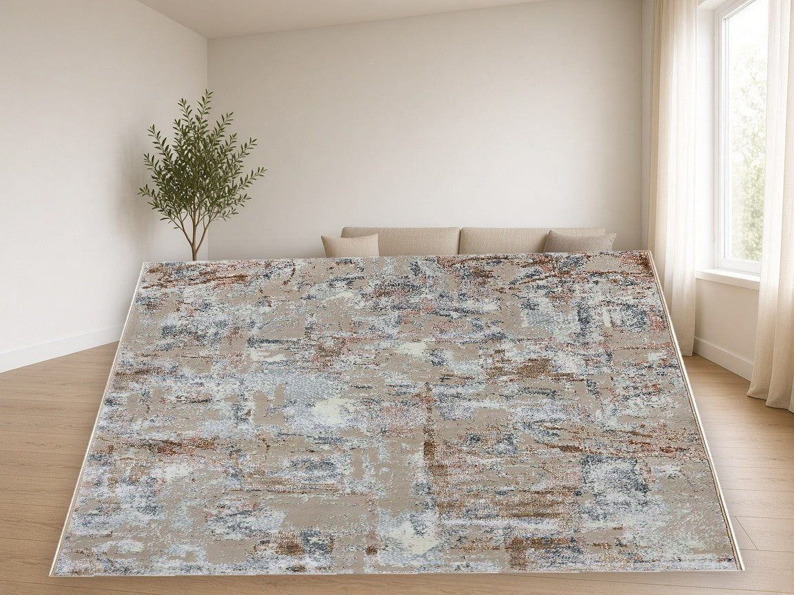 Warm Plaster Abstract Area Rug in a living room