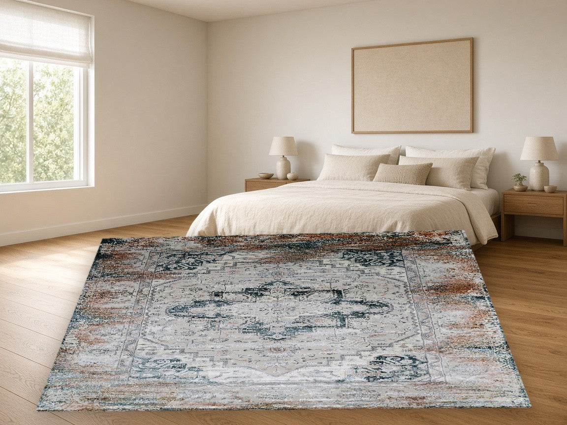 Faded Copper Medallion Vintage Area Rug in a bedroom